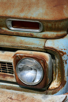 Color photograph of a rusted Chevy truck headlight by Crystal Nederman