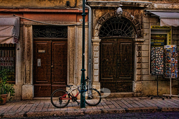 Bicycle and souvenir shop on the cobblestone streets of Rovinj, Croatia by Crystal Nederman