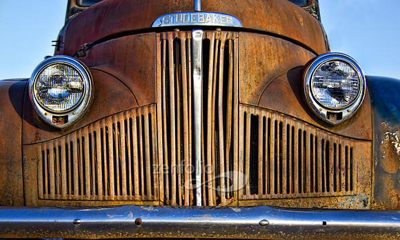 Color photograph of a Studebaker truck grill, rusted, busted and old by Crystal Nederman