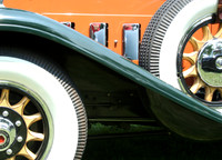 Color photograph of the wooden wheels and running board of a 1930 Packard by Crystal Nederman