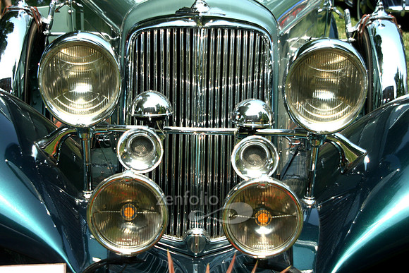 Color photograph of the chrome grill of a 1934 REO Dietrich by Crystal Nederman