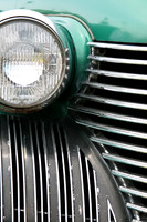 Color photograph of a Cadillac grill and headlight by Crystal Nederman