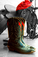 Colorized photograph of cowboy boots in a store window by Crystal Nederman