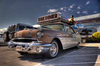 Color photograph of a vintage diner and car by Crystal Nederman.